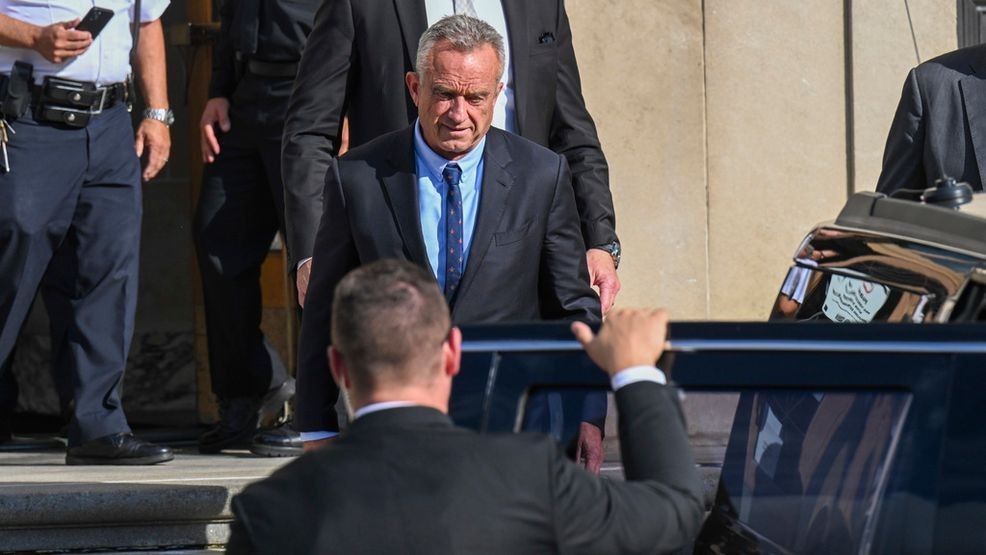 FILE - Independent presidential candidate Robert F. Kennedy Jr., top, leaves after giving testimony at the Albany County Courthouse, Aug. 7, 2024, in Albany, N.Y. (AP Photo/Hans Pennink, File)