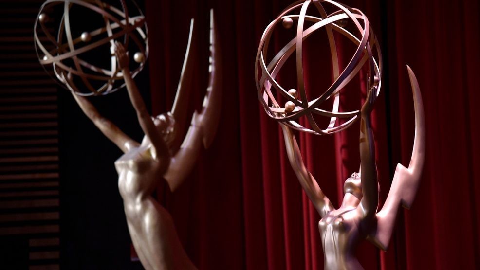 FILE - Emmy statues appear on stage at the 70th Primetime Emmy nominations announcement in Los Angeles on July 12, 2018. (Photo by Chris Pizzello/Invision/AP, File)