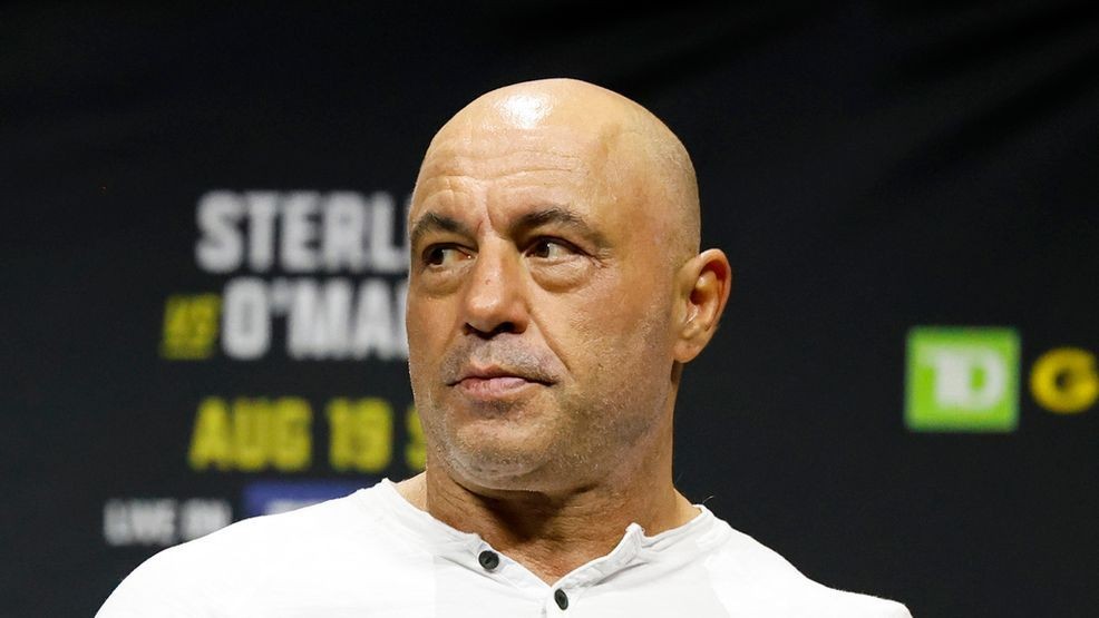 FILE - Joe Rogan is seen at the ceremonial weigh-in for the UFC 292 mixed martial arts event, Friday, Aug. 18, 2023, in Boston. (AP Photo/Gregory Payan, File)