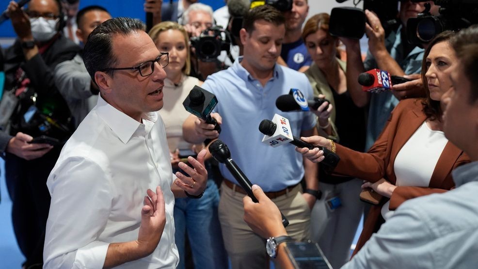 Pennsylvania Gov. Josh Shapiro speaks with members of the media during his visit to Philadelphia Youth Basketball's new Alan Horwitz "Sixth Man" Center in Philadelphia, Tuesday, July 30, 2024. (AP Photo/Matt Rourke)