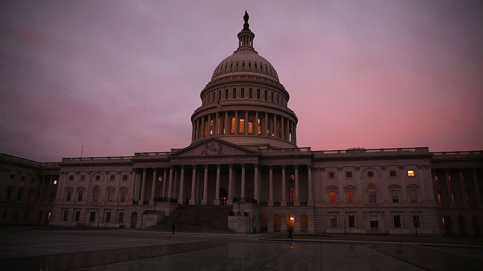 WASHINGTON, DC - MARCH 11:  The morning sun begins to rise in front of the U.S. Capitol, as Senate Democrats speak nonstop on the chamber floor about climate change on March 11, 2014 in Washington, DC. The self-titled 'climate caucus', a group of 26 senators working with a parallel House caucus, started speaking in the evening on March 10th and plan to continue until the morning of March 11th in an effort to elevate the issue of global warming.  (Photo by Mark Wilson/Getty Images)