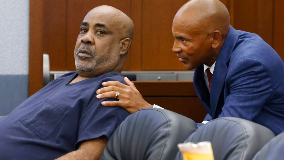 FILE - Duane "Keffe D" Davis, left, who is accused of orchestrating the 1996 slaying of hip-hop icon Tupac Shakur, listens to his attorney Carl Arnold during a hearing at the Regional Justice Center, on July 23, 2024, in Las Vegas. (Bizuayehu Tesfaye/Las Vegas Review-Journal via AP, File)