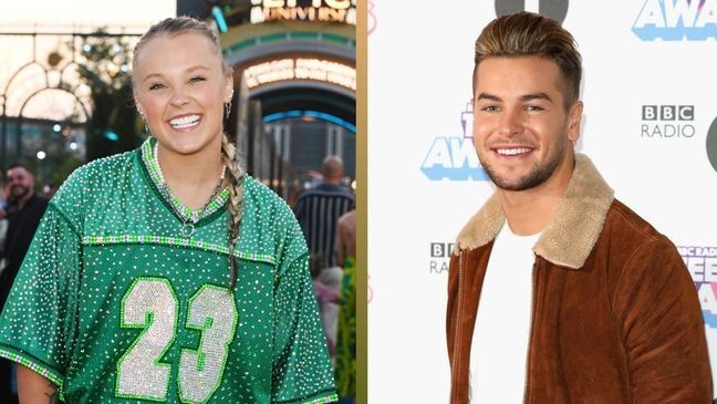 Jojo Siwa and Chris Hughes began dating after appearing on "Celebrity Big Brother UK" together. (Courtesy: Getty Images)