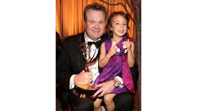 { }Actress Aubrey Anderson-Emmons poses with her 'Modern Family' TV dad Eric Stonestreet at 2012 Post Emmy party in 2012 in Los Angeles, California. (Credit: Christopher Polk/Getty Images for FOX)