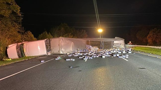 A tractor-trailer rollover crash early Tuesday morning, Oct. 22, 2024, spilled beer cans across Interstate 70 in Frederick County, shutting down all lanes. (Frederick County (MD) Fire & Rescue)