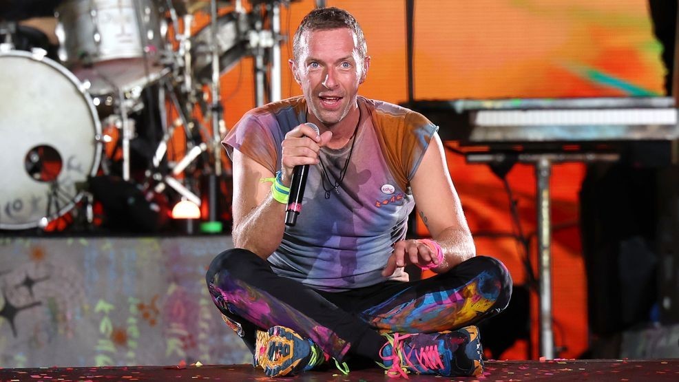 PASADENA, CALIFORNIA - SEPTEMBER 30: Chris Martin of Coldplay performs onstage at Rose Bowl Stadium on September 30, 2023 in Pasadena, California. (Photo by Monica Schipper/Getty Images)