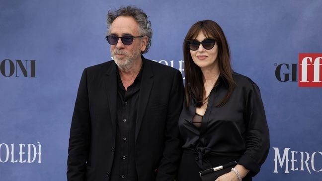 GIFFONI VALLE PIANA, ITALY - JULY 25: American film Director and producer Tim Burton (L) and Italian actress Monica Bellucci (R) attend Giffoni Film Festival 2025 photocall in Giffoni Valle Piana, Italy on July 25, 2025. (Photo by Iso Ekle/Anadolu via Getty Images)