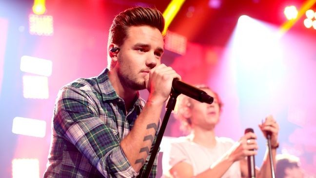 BURBANK, CA - NOVEMBER 22:  Musician Liam Payne performs onstage at the "One Direction iHeartRadio Album Release Party" hosted by Ryan Seacrest at the iHeartRadio Theater Los Angeles  Clear Channel's new music and events venue located at The Burbank Studios in Burbank, CA  (Photo by Christopher Polk/Getty Images for Clear Channel)