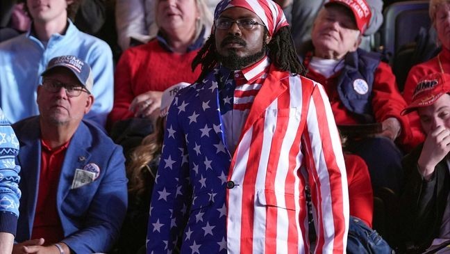 Supporters listen as Republican presidential nominee former President Donald Trump speaks during a campaign rally at Santander Arena, Monday, Nov. 4, 2024, in Reading, Pa. (AP Photo/Evan Vucci)