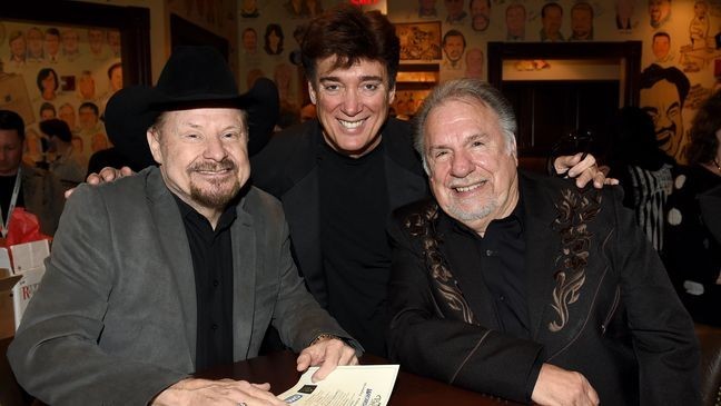 NASHVILLE, TN - FEBRUARY 08: Moe Bandy, Ronnie McDowell, and Gene Watson attend the 2nd Annual Legendary Lunch presented by Webster Public Relations and CMA at The Palm Restaurant on February 8, 2016 in Nashville, Tennessee. (Photo by Rick Diamond/Getty Images for Webster Public Relations)