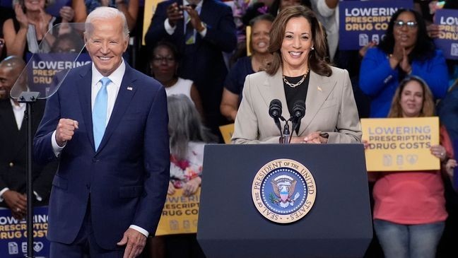 FILE - President Joe Biden, left, and Vice President Kamala Harris speak in Largo, Md., Aug. 15, 2024. (AP Photo/Stephanie Scarbrough, File)