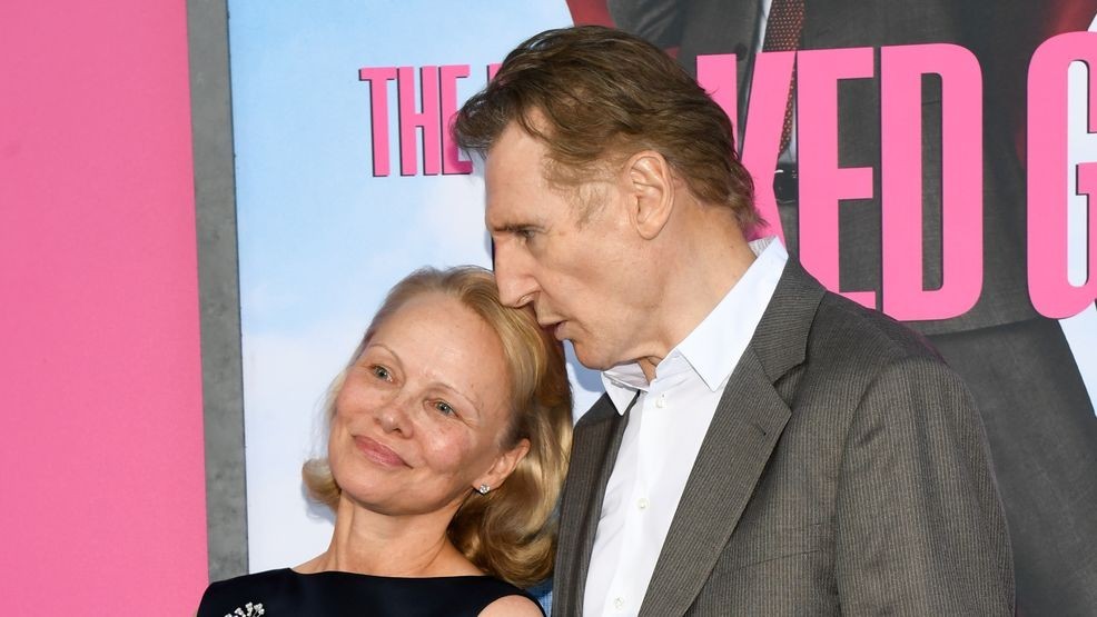 Image for story: Is Pamela Anderson and Liam Neeson’s relationship real or fake? 