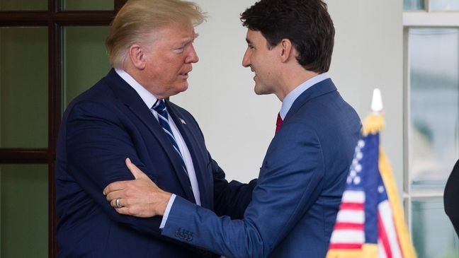 FILE - President Donald Trump greets Canadian Prime Minister Justin Trudeau upon his arrival at the White House, June 20, 2019, in Washington. (AP Photo/Alex Brandon, File)