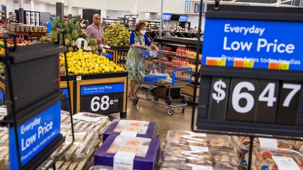 FILE - People buy groceries at a Walmart Superstore in Secaucus, New Jersey, July 11, 2024. (AP Photo/Eduardo Munoz Alvarez, File)