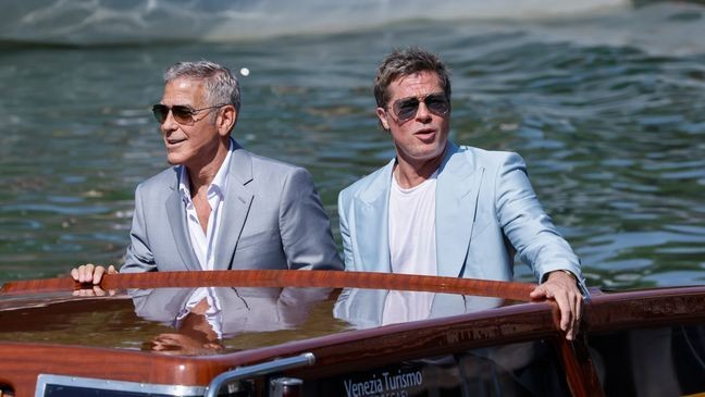 George Clooney, left, and Brad Pitt upon arrival for the press conference of the film 'Wolfs' during the 81st edition of the Venice Film Festival in Venice, Italy, on Sunday, Sept. 1, 2024. (Photo by Joel C Ryan/Invision/AP)