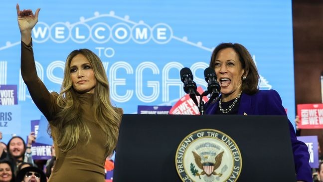 Jennifer Lopez (L) introduces Kamala Harris at a campaign rally at Craig Ranch Amphitheater on October 31, 2024, in North Las Vegas, Nevada. (Photo by Ethan Miller/Getty Images)