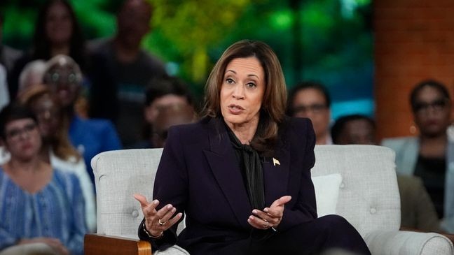 Democratic presidential nominee Vice President Kamala Harris answers an audience member's question as she joins Oprah Winfrey at Oprah's Unite for America Live Streaming event Thursday, Sept. 19, 2024 in Farmington Hills, Mich. (AP Photo/Paul Sancya)