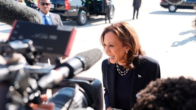 Democratic presidential nominee Vice President Kamala Harris talks to the media before boarding Air Force Two at Detroit Metropolitan Wayne County Airport, Thursday, August 8, 2024, in Romulus, Mich. (AP Photo/Julia Nikhinson)