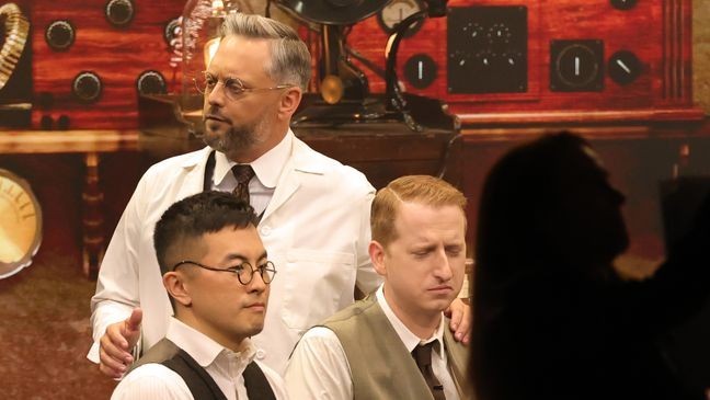 LOS ANGELES, CALIFORNIA - SEPTEMBER 14: (L-R) Bowen Yang, Nate Bargatze and James Austin Johnson speak onstage during the 77th Primetime Emmy Awards at Peacock Theater on September 14, 2025 in Los Angeles, California.  (Photo by Kevin Winter/Getty Images)