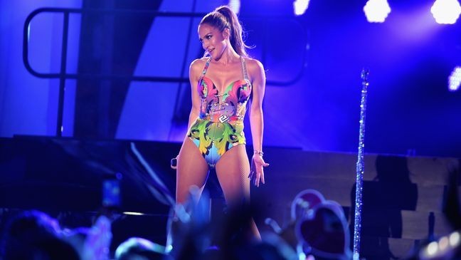 MIAMI BEACH, FL - JUNE 28: Jennifer Lopez performs onstage at the iHeartRadio Ultimate Pool Party presented by VISIT FLORIDA at Fontainebleau's BleauLive at Fontainebleau Miami Beach on June 28, 2014 in Miami Beach, Florida. (Photo by Larry Marano/Getty Images for Clear Channel)