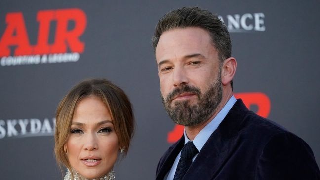 FILE - Jennifer Lopez and Ben Affleck arrive at the world premiere of "Air" on Monday, March 27, 2023, at the Regency Village Theatre in Los Angeles. (AP Photo/Ashley Landis, File)