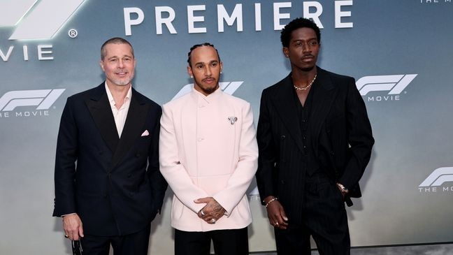 (L-R) Brad Pitt, Lewis Hamilton, and Damson Idris pose at the World Premiere of 'F1: The Movie' in Times Square on June 16, 2025 in New York City. (Credit: Jamie McCarthy/Getty Images for Warner Bros. Pictures)