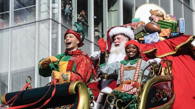 NEW YORK, NEW YORK - NOVEMBER 23: A person depicting Santa Claus participates in Macy's annual Thanksgiving Day Parade on November 23, 2023 in New York City. Thousands of people lined the streets to watch the 25 balloons and hundreds of performers march in this parade happening since 1924. (Photo by Stephanie Keith/Getty Images)