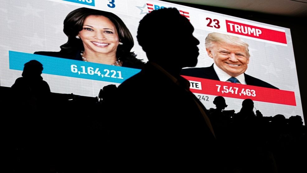 Howard University students watch live election results during a watch party near an election night event for Democratic presidential nominee Vice President Kamala Harris at Howard University in Washington, Tuesday, Nov. 5, 2024. (AP Photo/Nathan Howard)