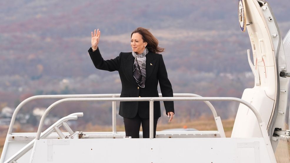 Democratic presidential nominee Vice President Kamala Harris waves as she boards Air Force Two at Wilkes-Barre Scranton International Airport in Scranton, Pa., Monday Nov. 4, 2024, en route to Allentown, Pa. (AP Photo/Jacquelyn Martin, Pool)