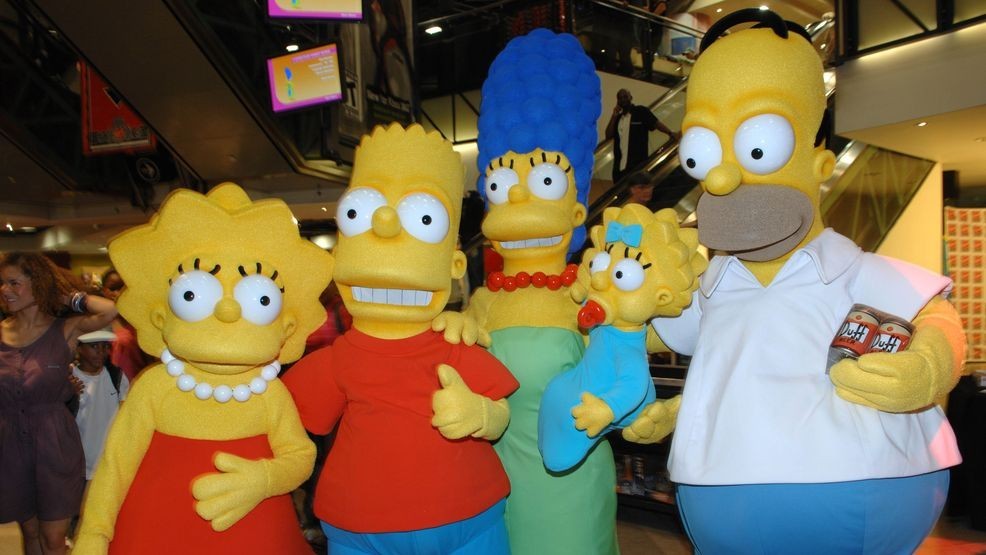 NEW YORK - JULY 25: (L-R) Costume characters Lisa Simpson, Bart Simpson, Marge Simpson, Maggie Simpson and Homer Simpson pose for a picture while promoting "The Simpsons Movie" at the Virgin Megastore Times Square on July 25, 2007 in New York City. (Photo by Brad Barket/Getty Images)