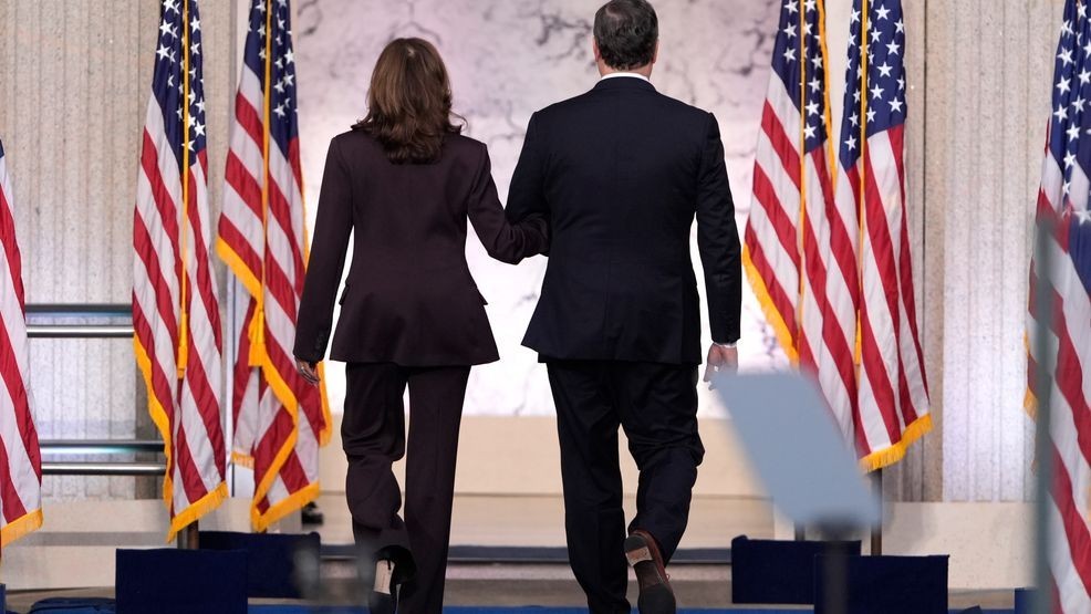 Second gentleman Doug Emhoff, right, walks with Vice President Kamala Harris as she departs after delivering a concession speech for the 2024 presidential election on the campus of Howard University in Washington, Wednesday, Nov. 6, 2024. (AP Photo/J. Scott Applewhite)