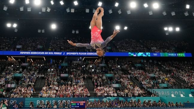 Simone Biles, of the United States, competes during the women's artistic gymnastics individual floor finals at Bercy Arena at the 2024 Summer Olympics, Monday, Aug. 5, 2024, in Paris, France. (AP Photo/Abbie Parr)