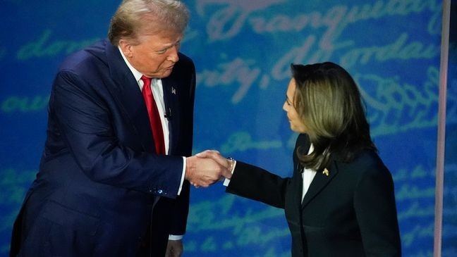 Republican presidential nominee former President Donald Trump and Democratic presidential nominee Vice President Kamala Harris shake hands before the start of an ABC News presidential debate at the National Constitution Center, Sept. 10, 2024, in Philadelphia. (AP Photo/Alex Brandon, file)