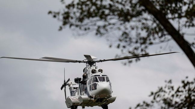 A medical helicopter takes off near downtown in the aftermath of Hurricane Helene, Monday, Sept. 30, 2024, in Asheville, N.C. (AP Photo/Mike Stewart)