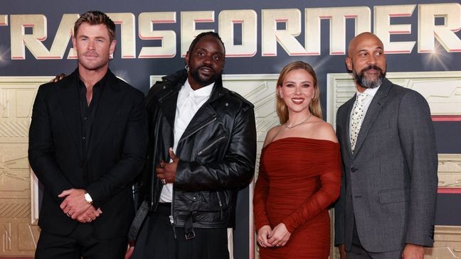 Chris Hemsworth, from left, Brian Tyree Henry, Scarlett Johansson and Keegan-Michael Key pose for photographers upon arrival at the premiere for the film 'Transformers One' on Thursday, Sept. 19, 2024 in London. (Photo by Vianney Le Caer/Invision/AP)