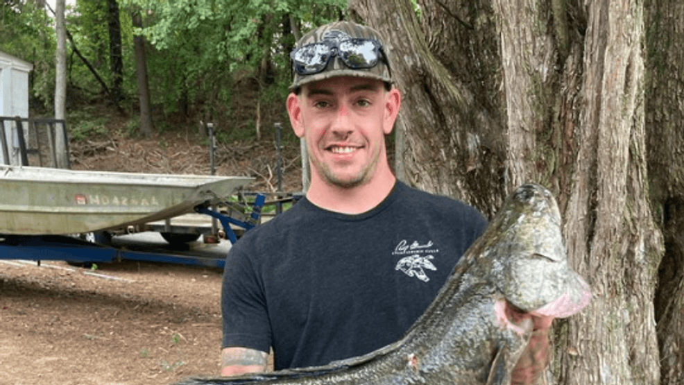 Jake Steppe of Sudlersville, MD caught this 19.8 lb snakehead by bow (Credit:{&nbsp;}Brett Coakley via Maryland DNR.)