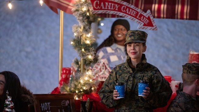 After a snowstorm prevents all the presents from being delivered to base, two rival marines must team up for a special mission…to save Christmas.  Photo:  Janel Parrish  Credit: ©2025 Hallmark Media/Photographer:{&nbsp;}Fred Hayes