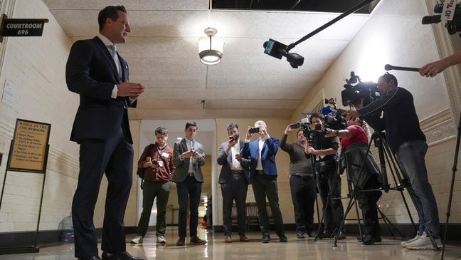 America PAC lawyer Chris Gober speaks with members of the media ahead of a hearing at a City Hall courtroom in Philadelphia, Monday, Nov. 4, 2024. (AP Photo/Matt Rourke)