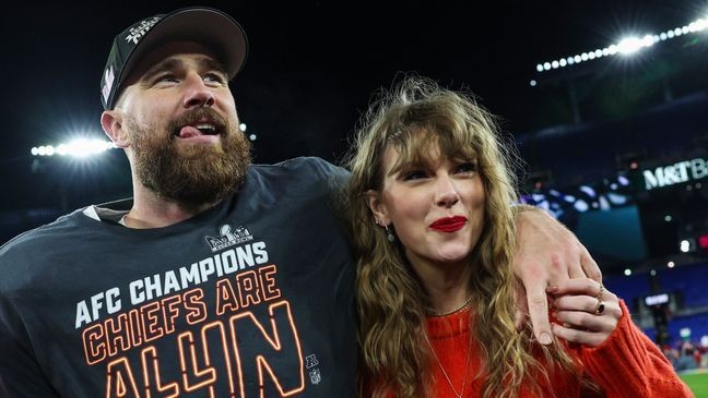 BALTIMORE, MARYLAND - JANUARY 28: Travis Kelce #87 of the Kansas City Chiefs (L) celebrates with Taylor Swift after defeating the Baltimore Ravens in the AFC Championship Game at M&T Bank Stadium on January 28, 2024 in Baltimore, Maryland.  (Photo by Patrick Smith/Getty Images)