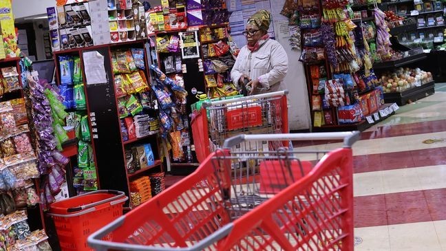 People shop in a supermarket on October 30, 2024, in the Flatbush neighborhood of the Brooklyn borough in New York City. (Photo by Michael M. Santiago/Getty Images)