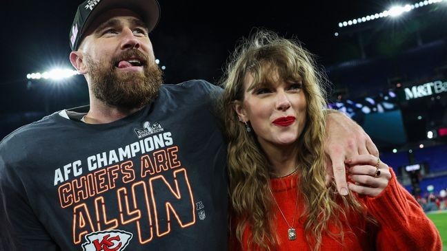 BALTIMORE, MARYLAND - JANUARY 28: Travis Kelce #87 of the Kansas City Chiefs (L) celebrates with Taylor Swift after defeating the Baltimore Ravens in the AFC Championship Game at M&T Bank Stadium on January 28, 2024 in Baltimore, Maryland.  (Photo by Patrick Smith/Getty Images)