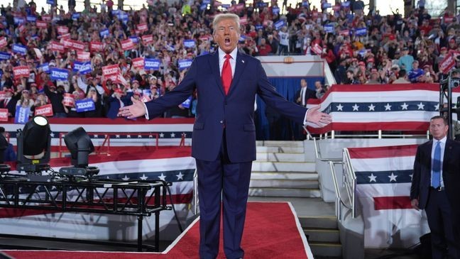 Republican presidential nominee former President Donald Trump arrives to speak at a campaign rally at J.S. Dorton Arena, Monday, Nov. 4, 2024, in Raleigh, N.C. (AP Photo/Evan Vucci)