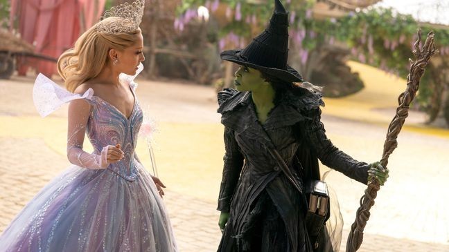 L to R: Ariana Grande is Glinda and Cynthia Erivo is Elphaba in WICKED FOR GOOD, directed by Jon M. Chu. (Courtesy:{&nbsp;}Universal Pictures)