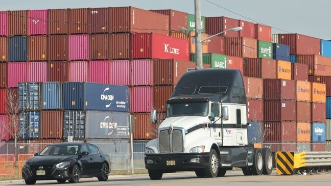 Shipping containers are seen at Port of Newark on October 4, 2024, in Newark, New Jersey. (Photo by Michael M. Santiago/Getty Images)