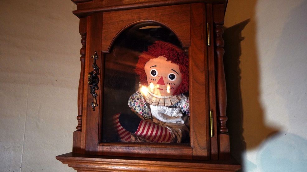 The "Annabelle" doll in the living room at the "Conjuring" house in Harrisville, RI on Oct. 14, 2020. The house, a 3,100 square foot farmhouse and eight-acre property made famous by the movie series that began in 2013, is open for overnight stays. The owners are Jennifer and Cory Heinzen, paranormal investigators. (Photo by Barry Chin/The Boston Globe via Getty Images)