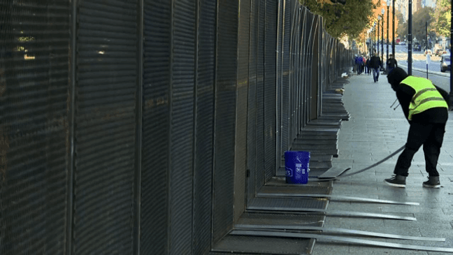 Workers set up a fence around the area near the White House where Vice President Kamala Harris will speak on Tuesday, October 28, 2024. (Pool)