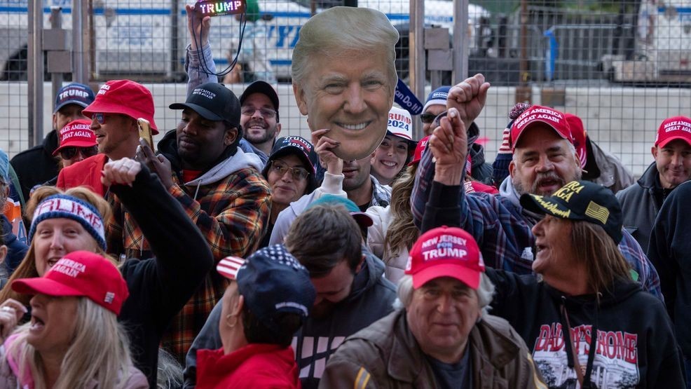 Supporters of Republican presidential nominee former President Donald Trump gather for his campaign rally outside Madison Square Garden, Sunday, Oct. 27, 2024, in New York. (AP Photo/Yuki Iwamura)