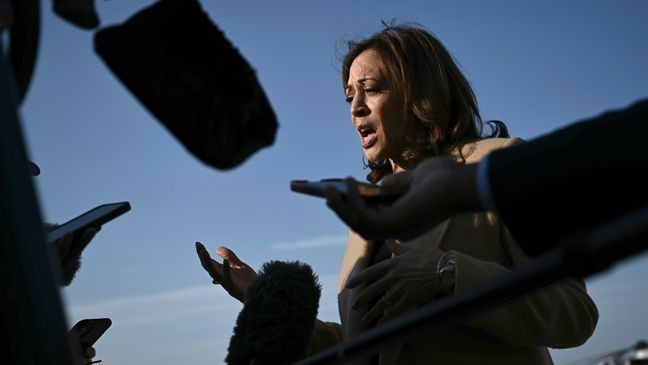 Democratic presidential nominee Vice President Kamala Harris speaks to the press before boarding Air Force Two at Joint Base Andrews, Md., Saturday, Oct. 12, 2024, en route to North Carolina for a campaign event. (Brendan Smialowski/Pool via AP)