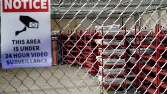 Mail-in ballots sit in a secure area of the Allegheny County Elections Division warehouse, Wednesday, Oct. 30, 2024, in Pittsburgh. (AP Photo/Matt Freed)