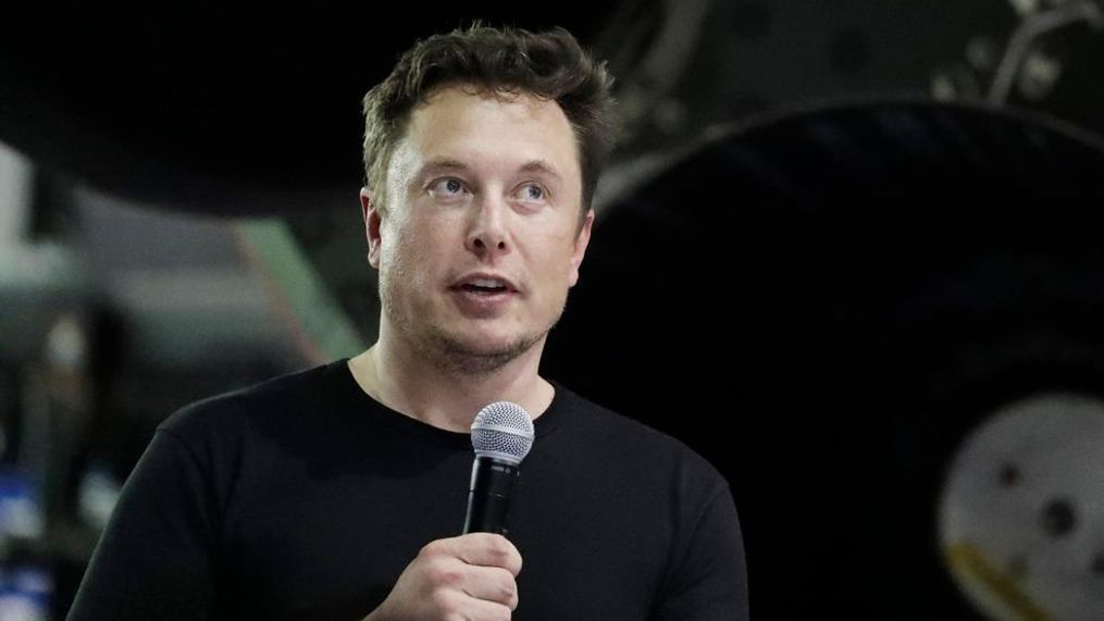 In this Monday, Sept. 17, 2018, file photo Tesla CEO and SpaceX founder and chief executive Elon Musk speaks after announcing Japanese billionaire Yusaku Maezawa as the first private passenger on a trip around the moon in Hawthorne, Calif. Tesla Inc. has turned over documents to the U.S. Justice Department after statements by Musk about taking the company private, the electric car maker confirmed Tuesday, Sept. 18. (AP Photo/Chris Carlson, File)